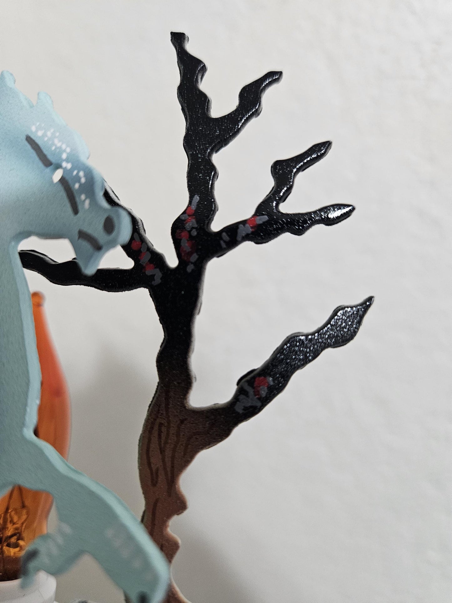 Ice Dragon Art as a Night Light with a flickering flame bulb- made from durable, hand-painted steel