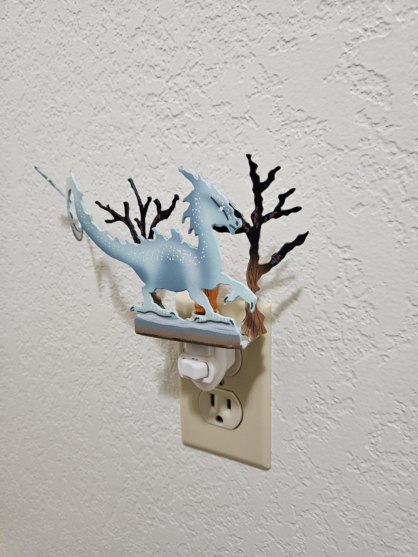 Ice Dragon Art as a Night Light with a flickering flame bulb- made from durable, hand-painted steel