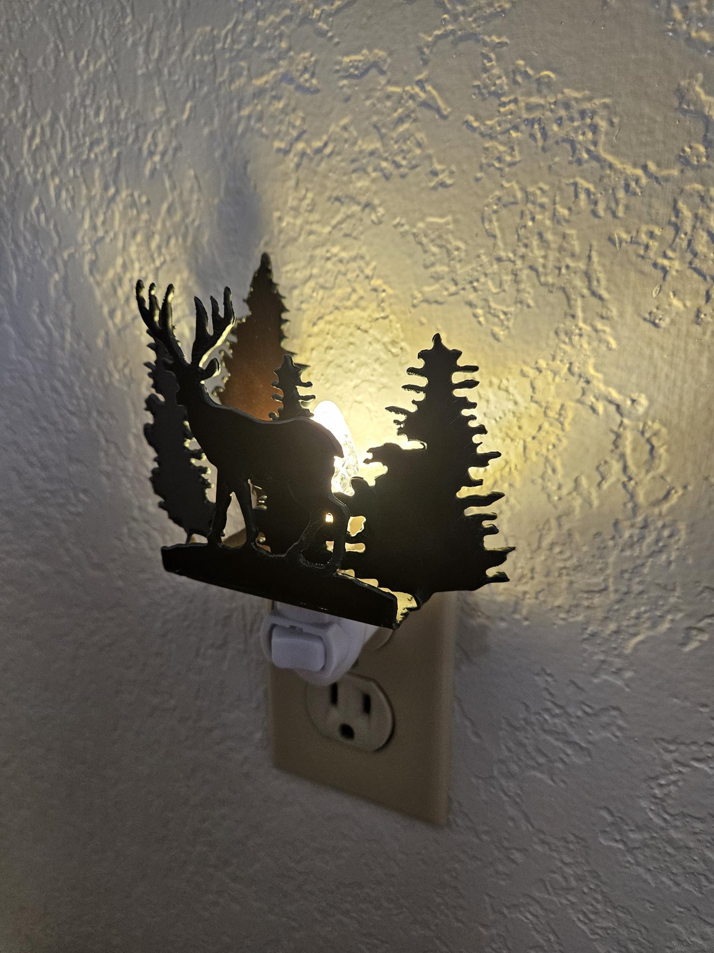 Deer Night Light with forest and scene made out of rusted steel