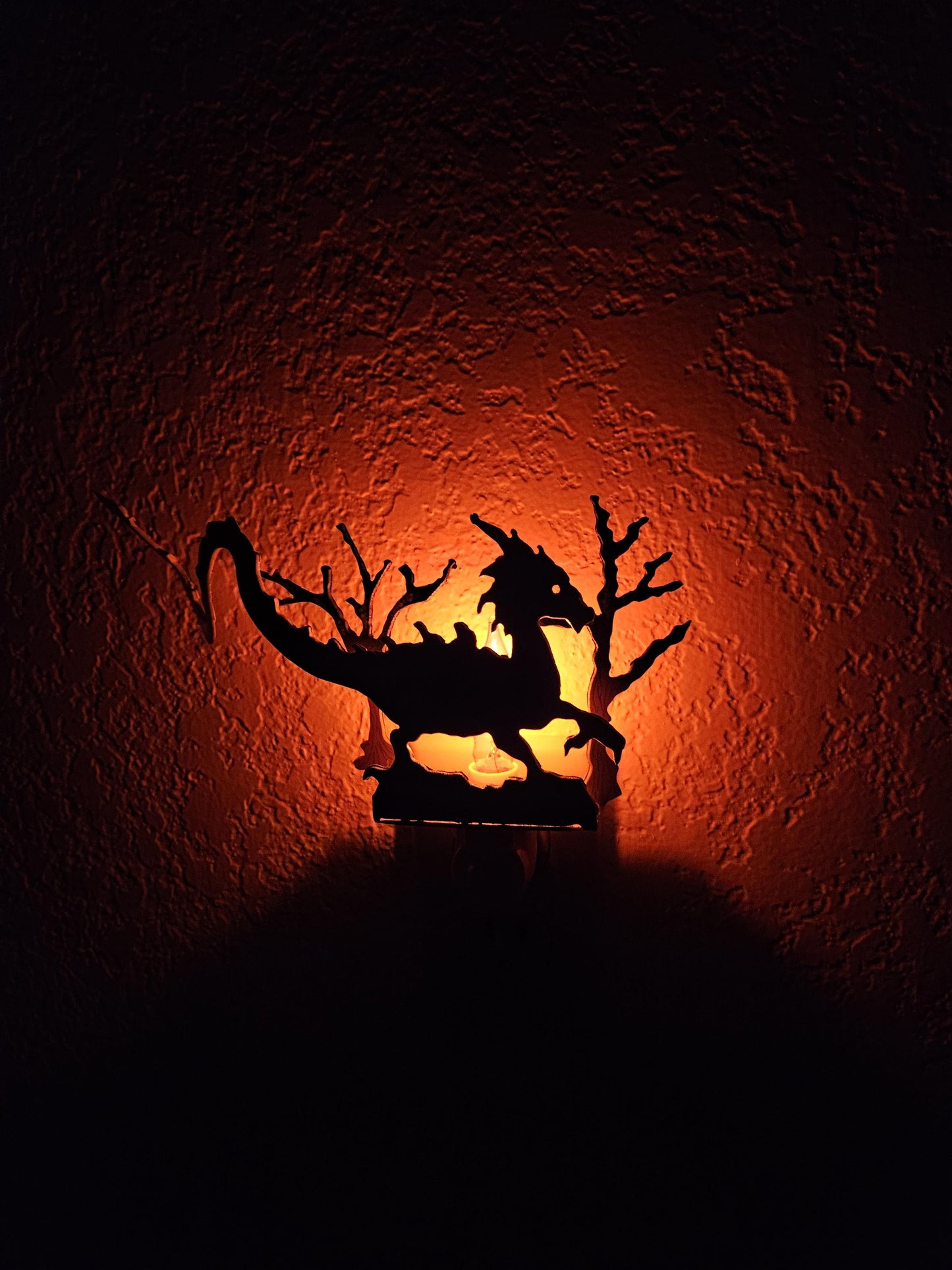 Ice Dragon Art as a Night Light with a flickering flame bulb- made from durable, hand-painted steel