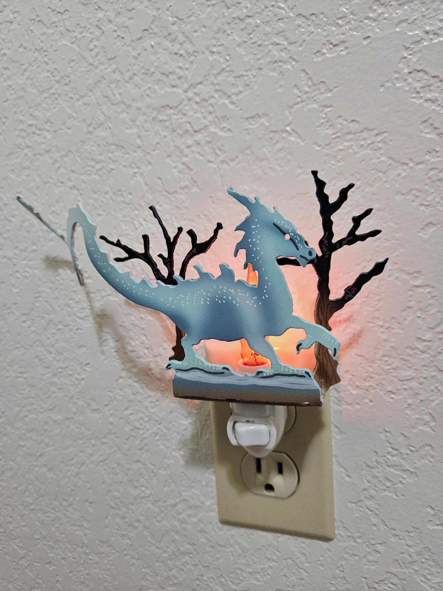 Ice Dragon Art as a Night Light with a flickering flame bulb- made from durable, hand-painted steel
