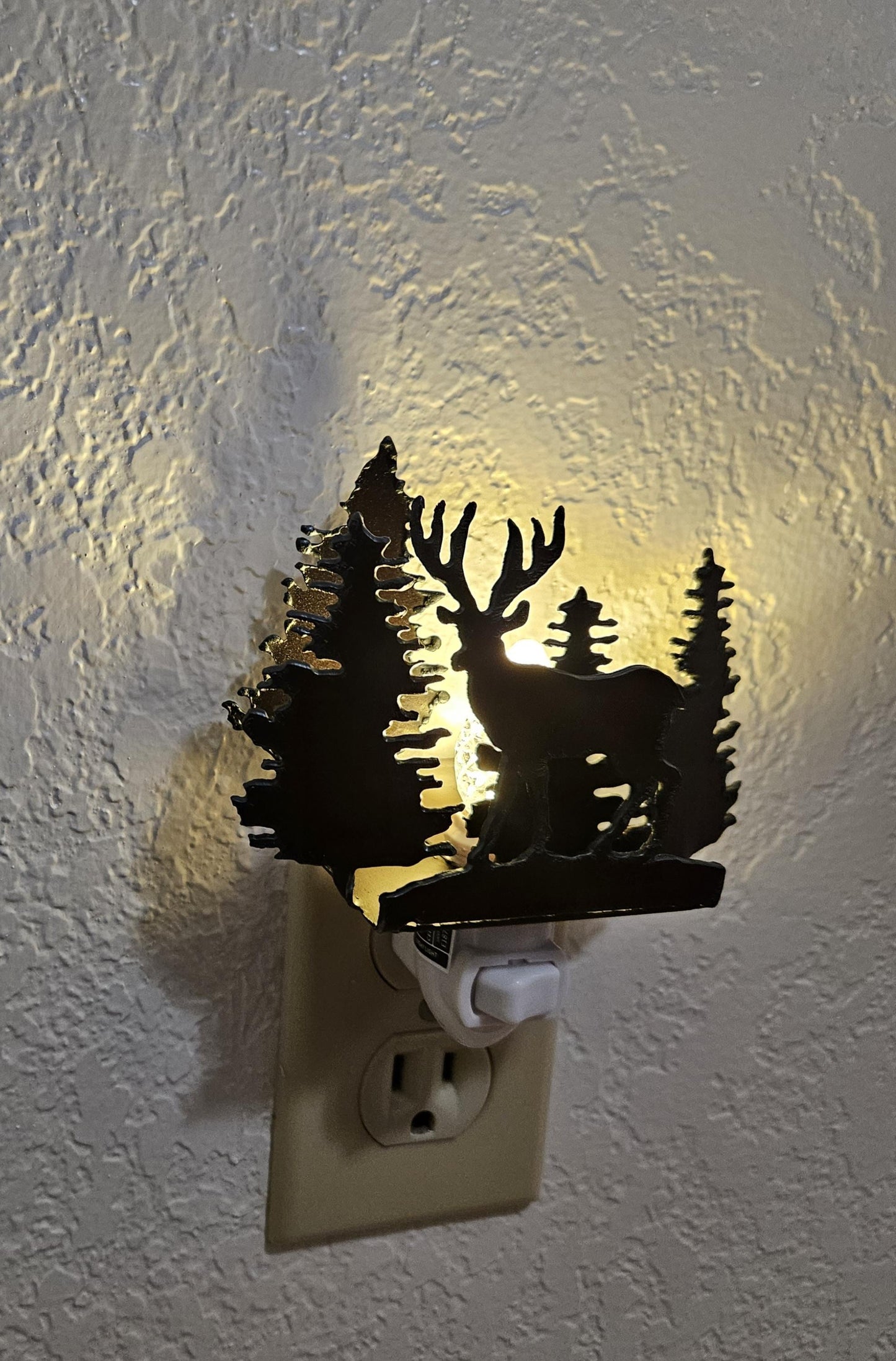Deer Night Light with forest and scene made out of rusted steel