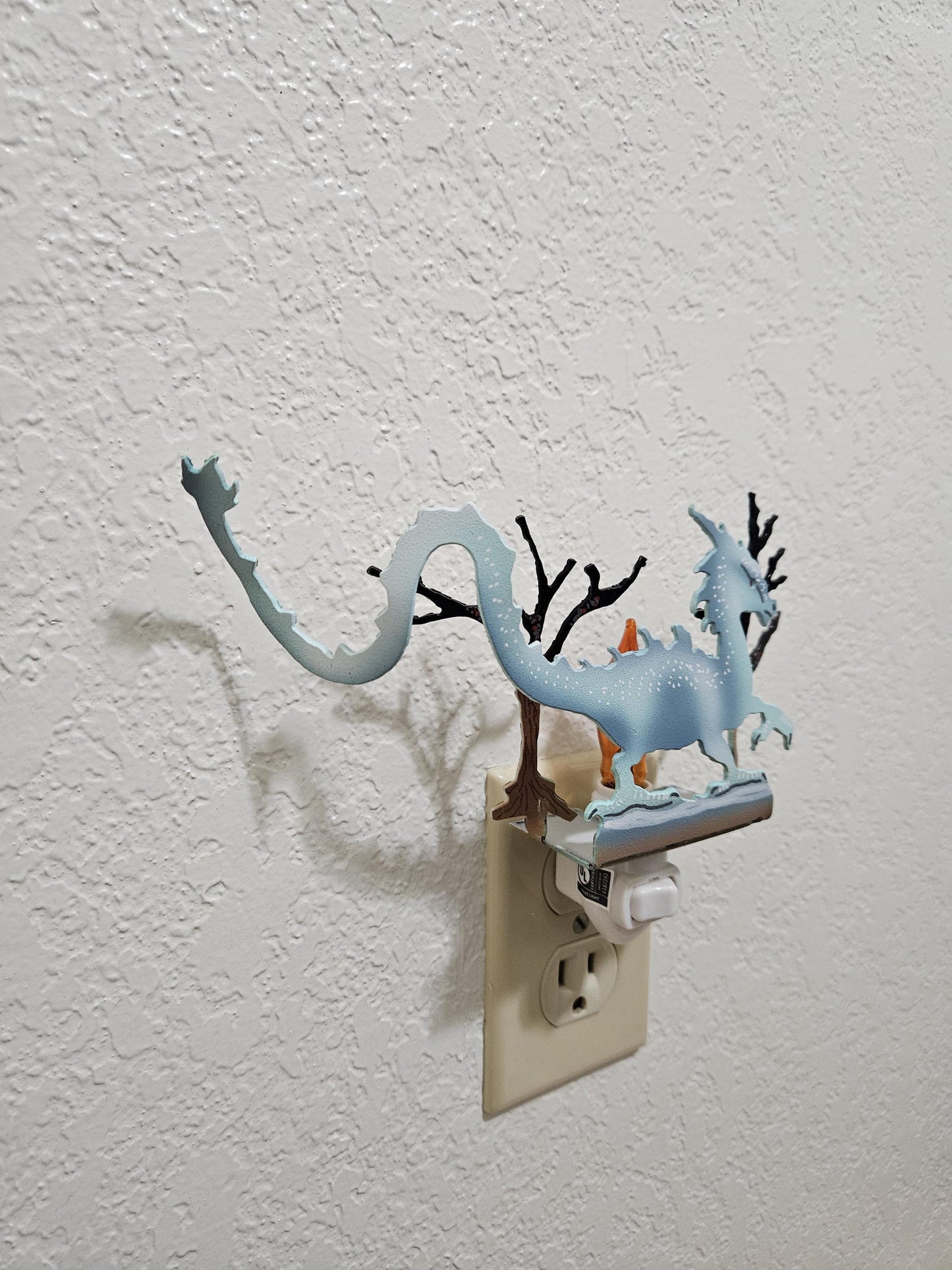 Ice Dragon Art as a Night Light with a flickering flame bulb- made from durable, hand-painted steel