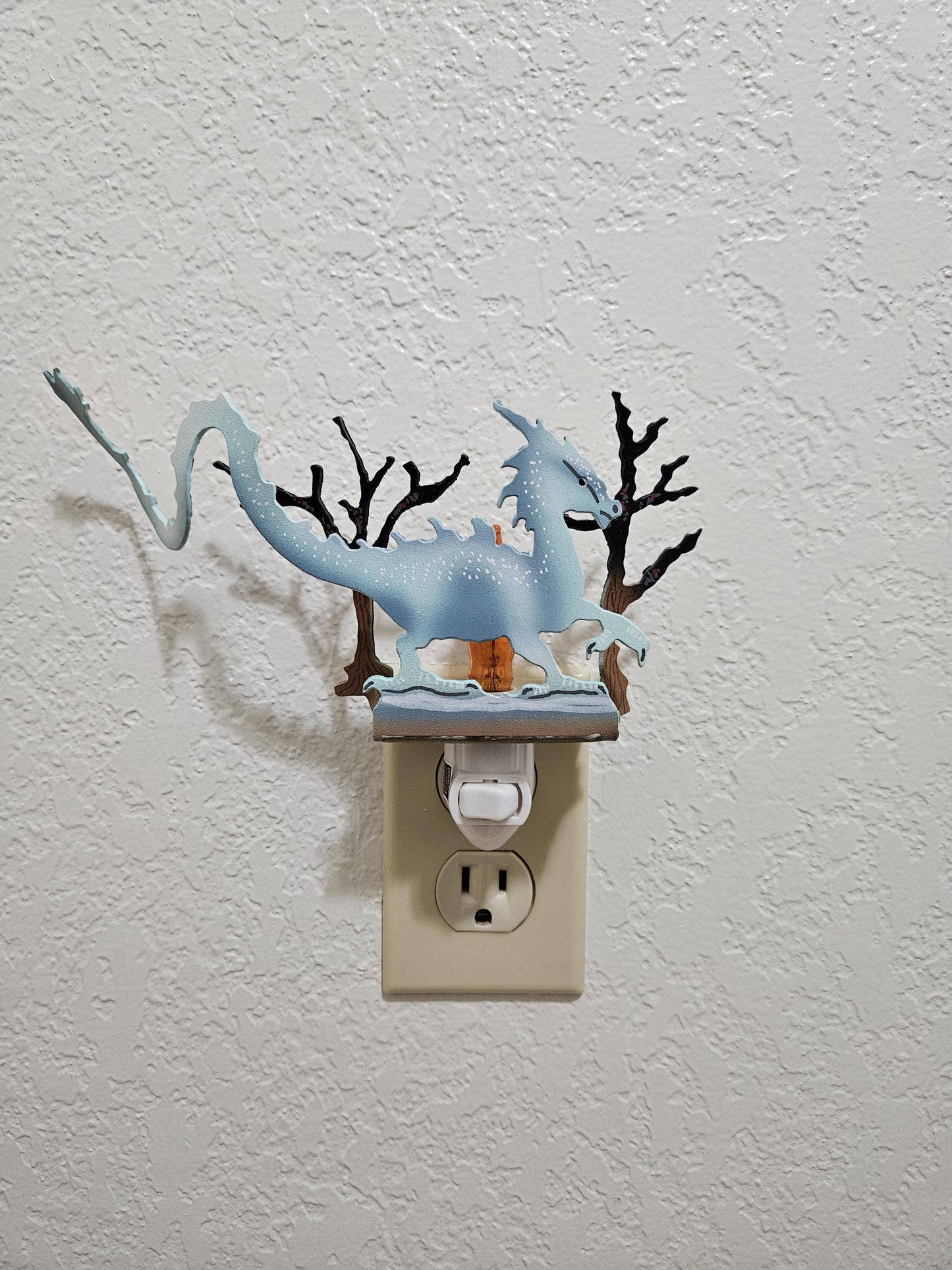 Ice Dragon Art as a Night Light with a flickering flame bulb- made from durable, hand-painted steel