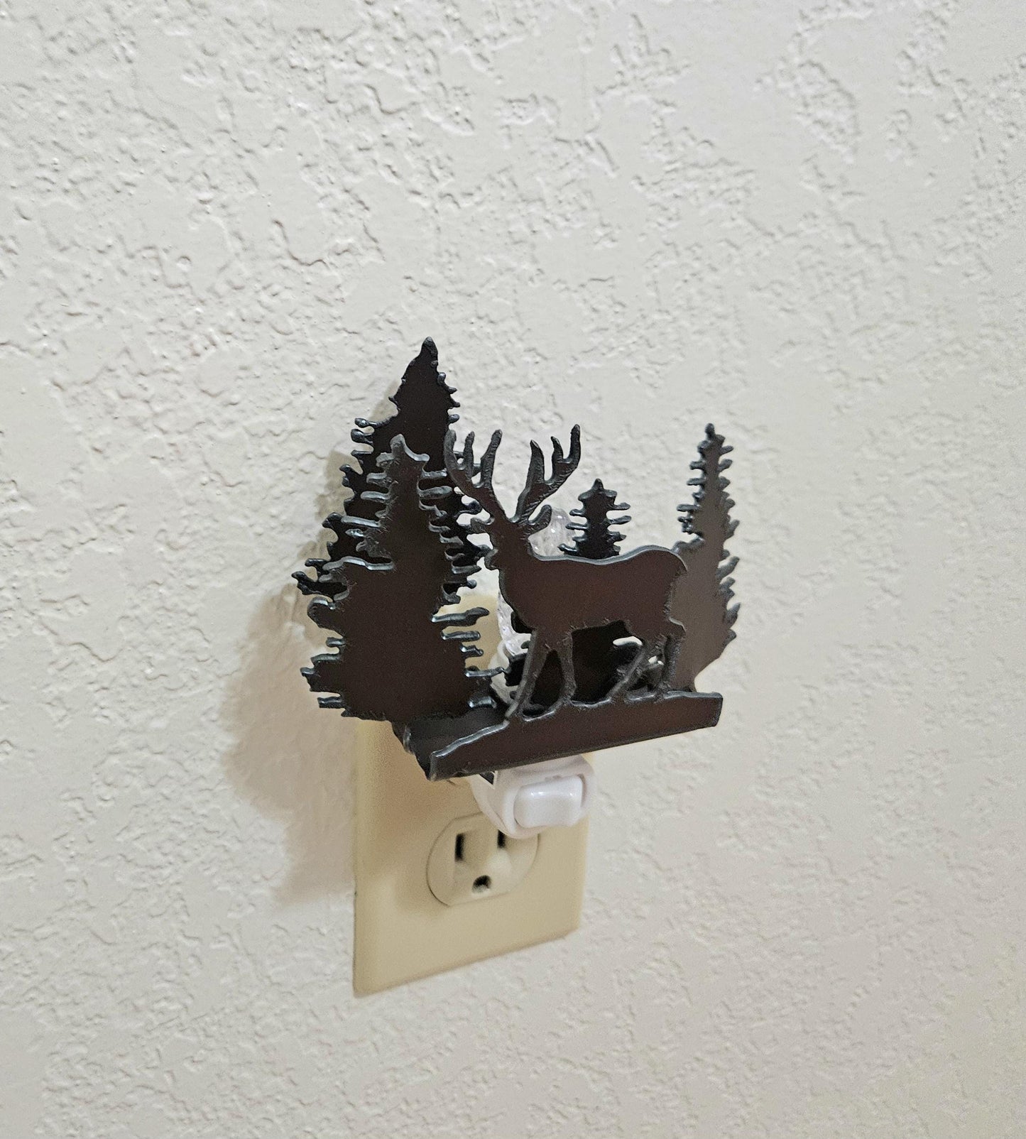 Deer Night Light with forest and scene made out of rusted steel