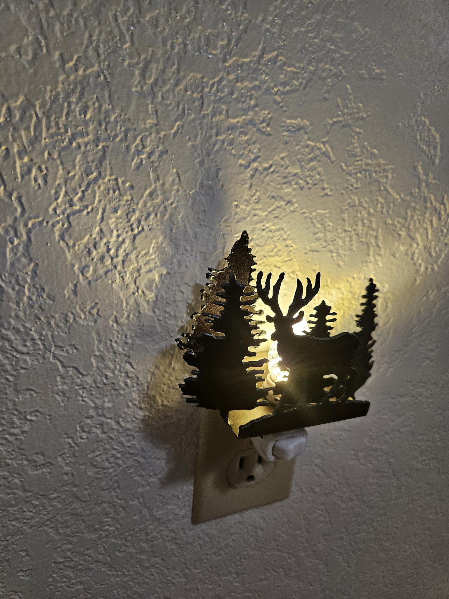 Deer Night Light with forest and scene made out of rusted steel