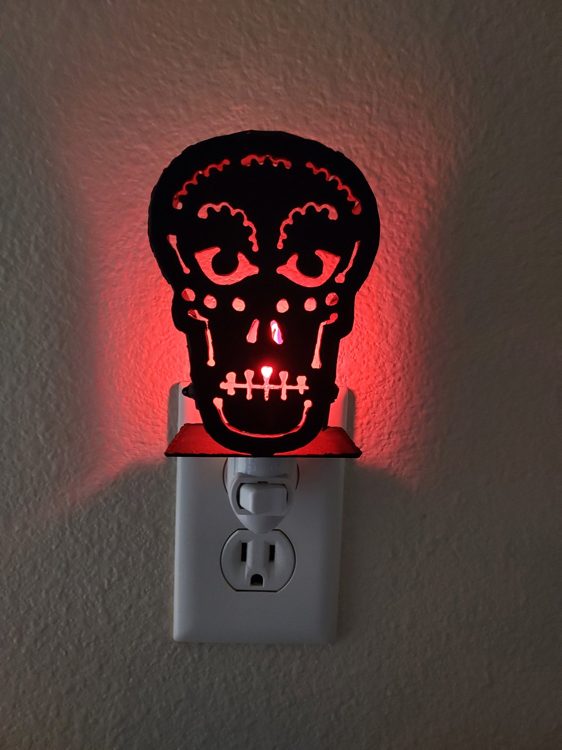 Sugar Skull Night Light Art Made out of Black Steel with Flickering Flame Bulb